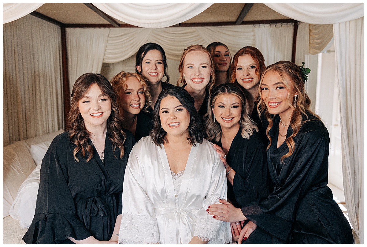 Bride and bridesmaids getting ready by Virginia Wedding Company