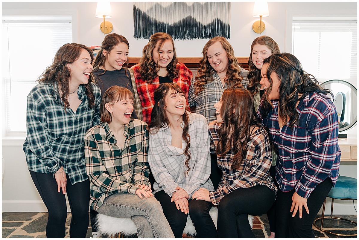Bride getting ready with bridesmaids by Virginia Wedding Company