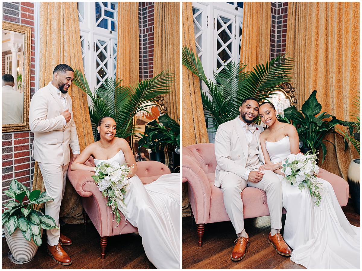bride and groom sitting on couch smiling