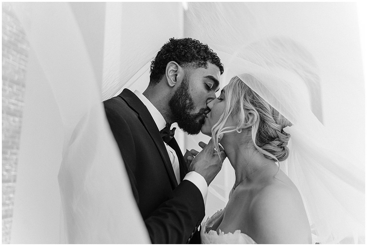 bride and groom kissing