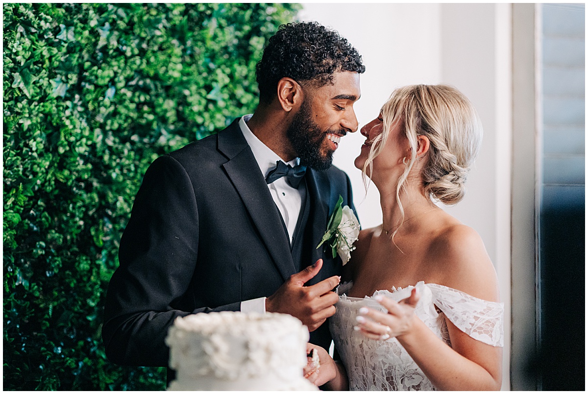 bride and groom laughing and smiling