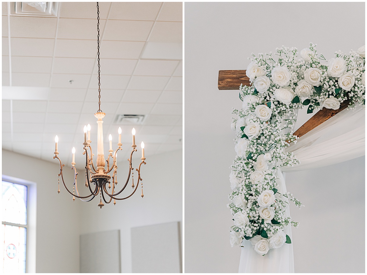 Chandelier and flowers on arch