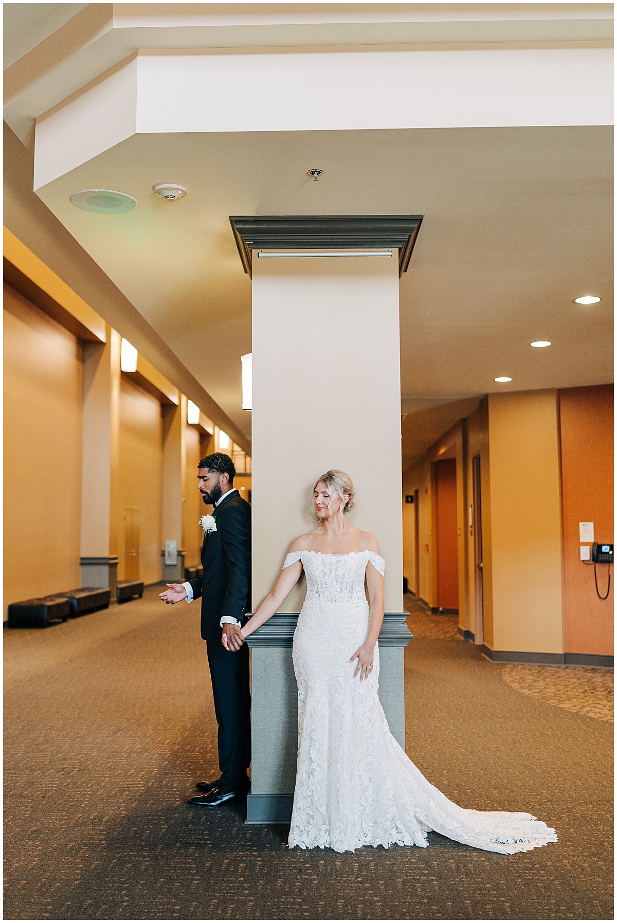 bride and groom praying first look