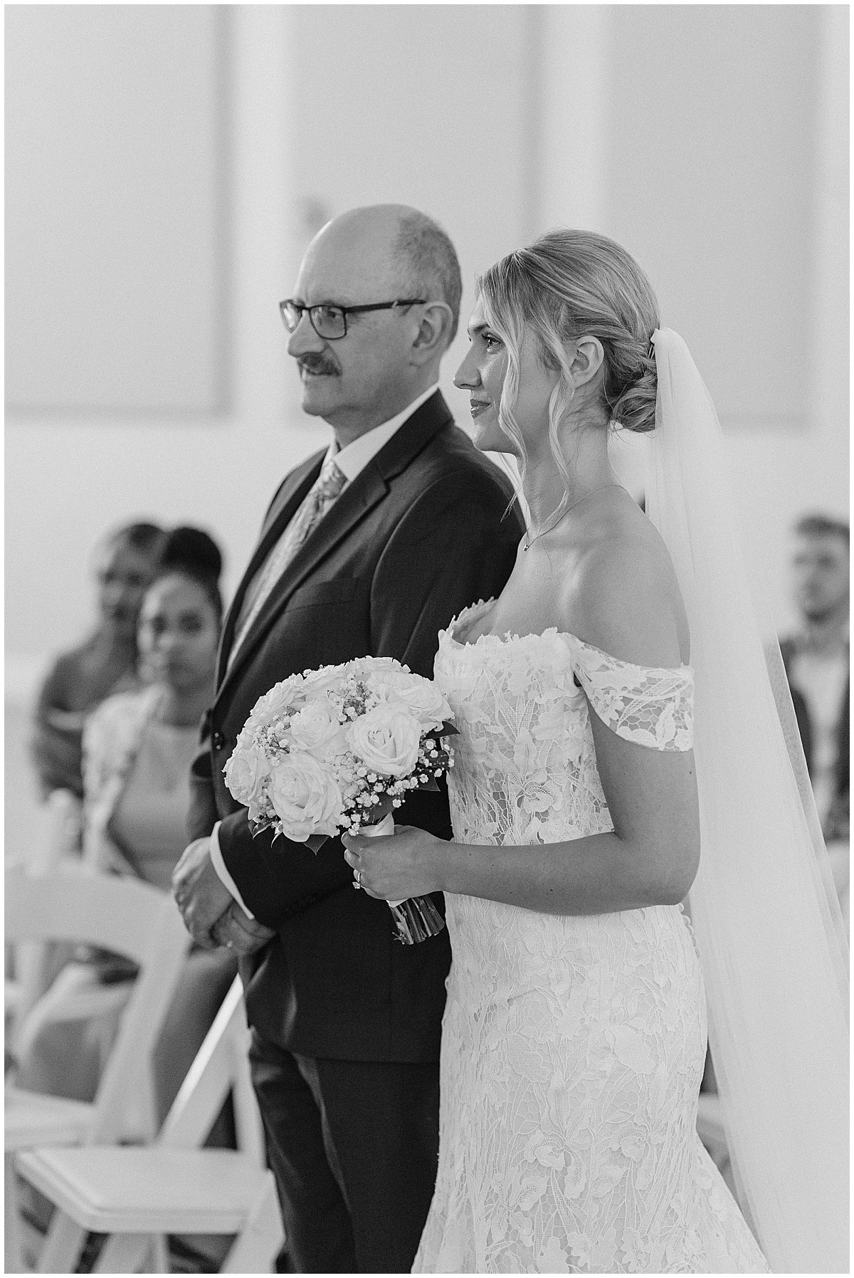 Bride walking with father
