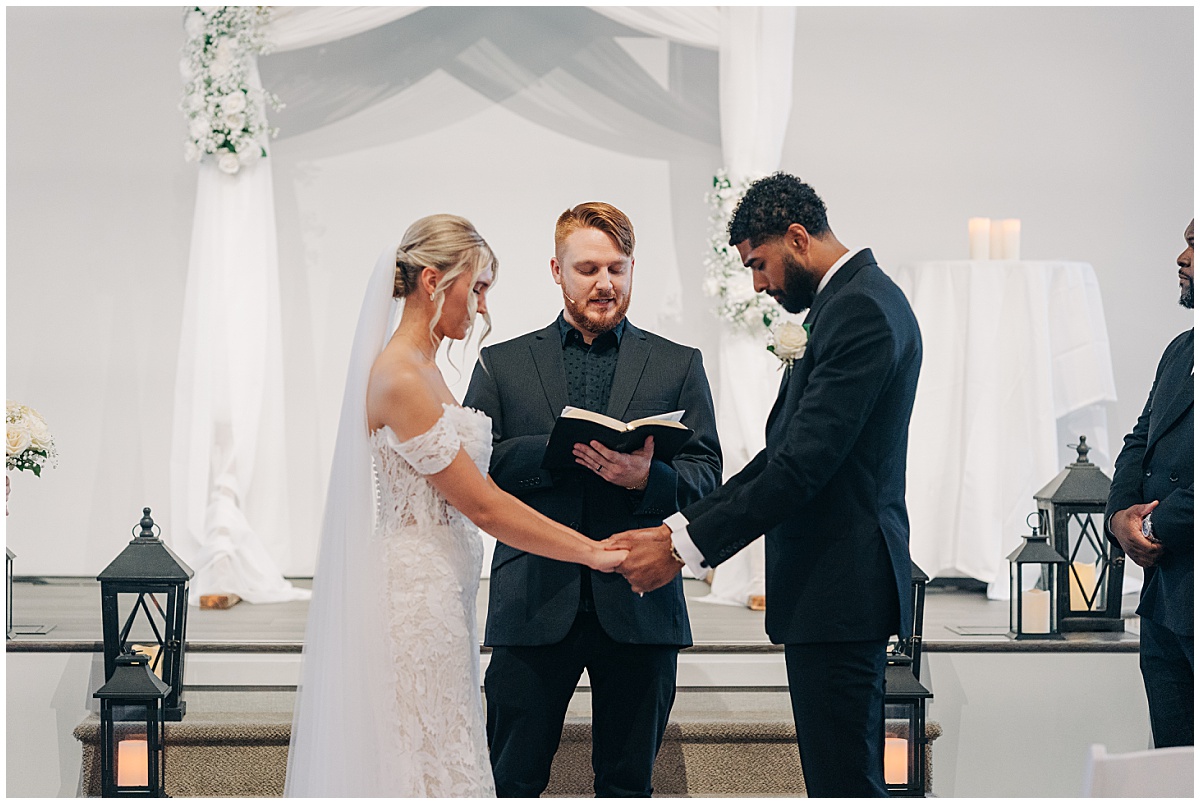 Bride and groom in prayer