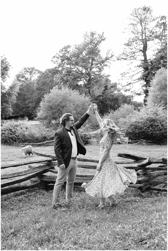 man spinning his fiance around dancing