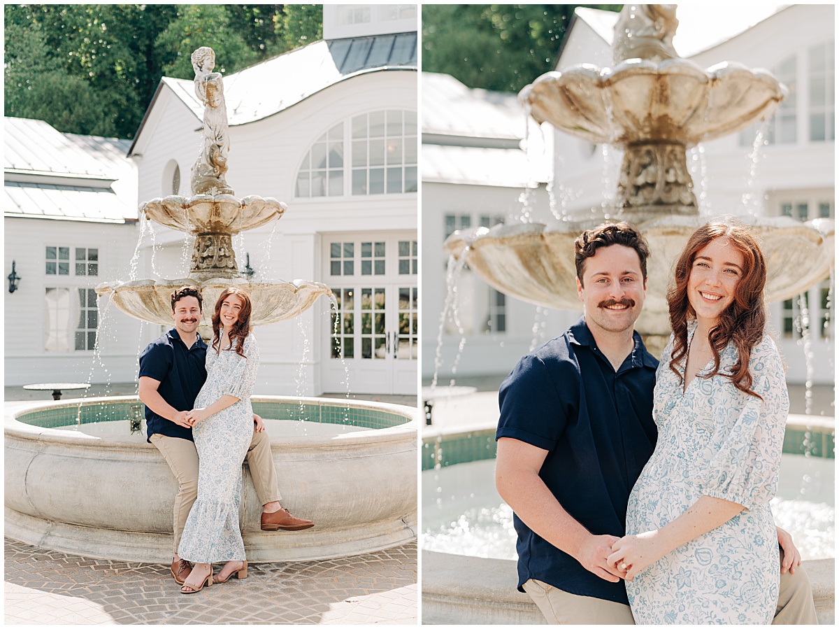 couple sitting on fountain and smiling